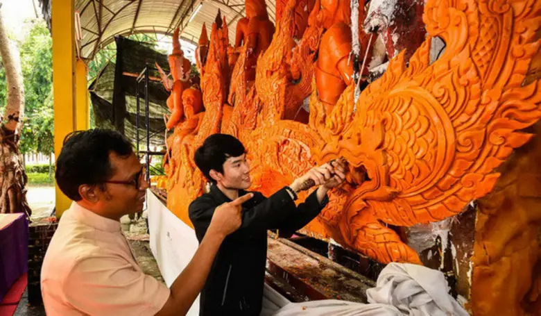 ไทยสมายล์ ร่วมสืบสานงานบุญประเพณีแห่เทียน...