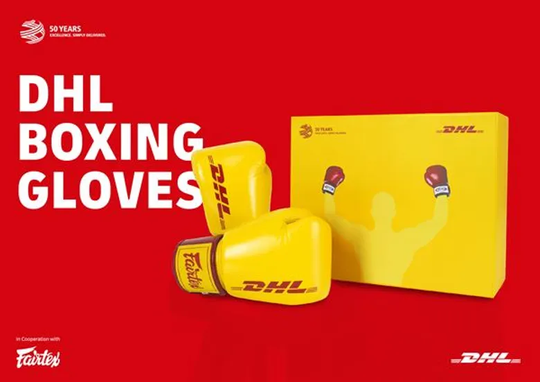 ฉลองครบรอบ 50 ปีดีเอชแอล #50YearsofDHL ดีเอชแอล เอ๊กซ์เพรส ประเทศไทย จับมือ แฟร์เท็กซ์ ผลิตนวมลิมิเต็ดอิดิชั่น 300 คู่ จำหน่ายทั่วโลกผ่าน Fairtex.com 25 ก.ย. นี้ 20.00 น. เป็นต้นไป
