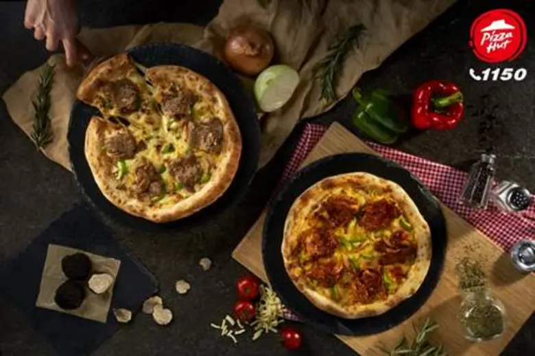 Allez Cuisine! Pizza Hut Teams Up with Famous Chef to Create  the "Philly Cheese Pizza with Truffle Cheese Stuffed Crust"  to Attract All Consumer Generations