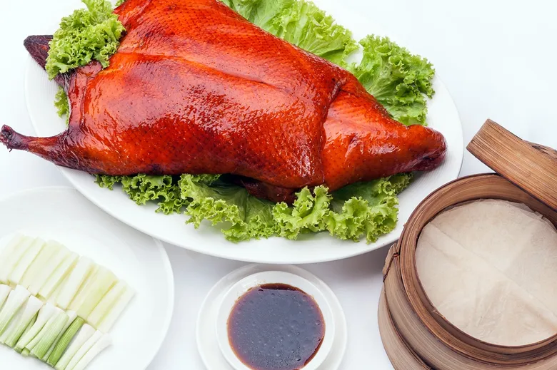 "Come 4 persons, Get 1 Peking duck FREE" at Yok Chinese Restaurant