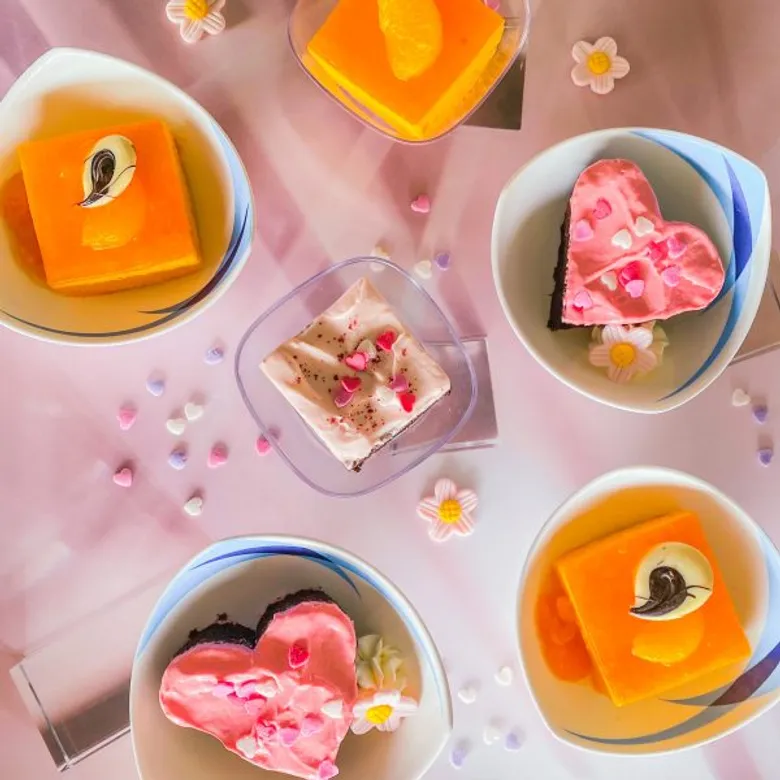 Bangkok Airways celebrates the Chinese New Year and Valentine's Day 2024 by serving sumptuous in-flight desserts 'Love Sacher Cake' and 'Orange Cake'